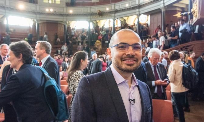 Demis Hassabis stood in front of the audience at the end of the Obert C. Tanner Lecture on Artificial Intelligence and Human Values