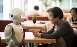 Image by Zayatssv from Adobe Stock - Title - robot assistant helps a person in a hospital, future concept