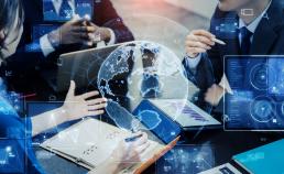 Decoration only - AdobeStock by metamorworks -described as a mixed media of group of multinational businesspeople meeting in the office and digital technology concept. 
